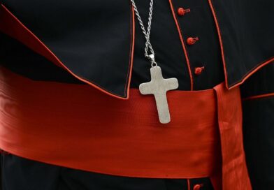 Pope Francis strips conservative US cardinal of some privileges, Vatican official says