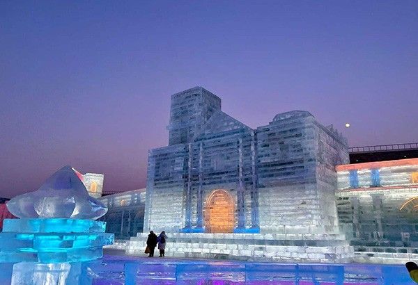 San Agustin Church Shines at China's Ice Festival Until Feb - Pinas Times
